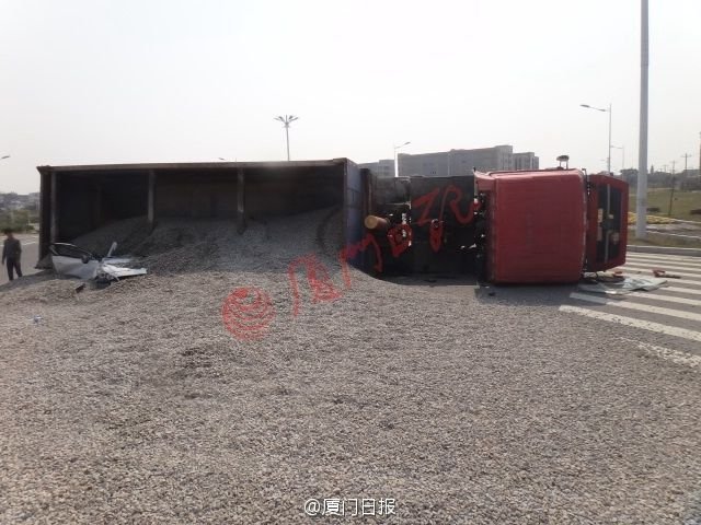 Китайская пара погибла под 50 тоннами гравия Китайская пара погибла под 50 тоннами гравия